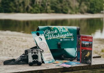 Discover Pass adventure kit photo on the shoreline.
